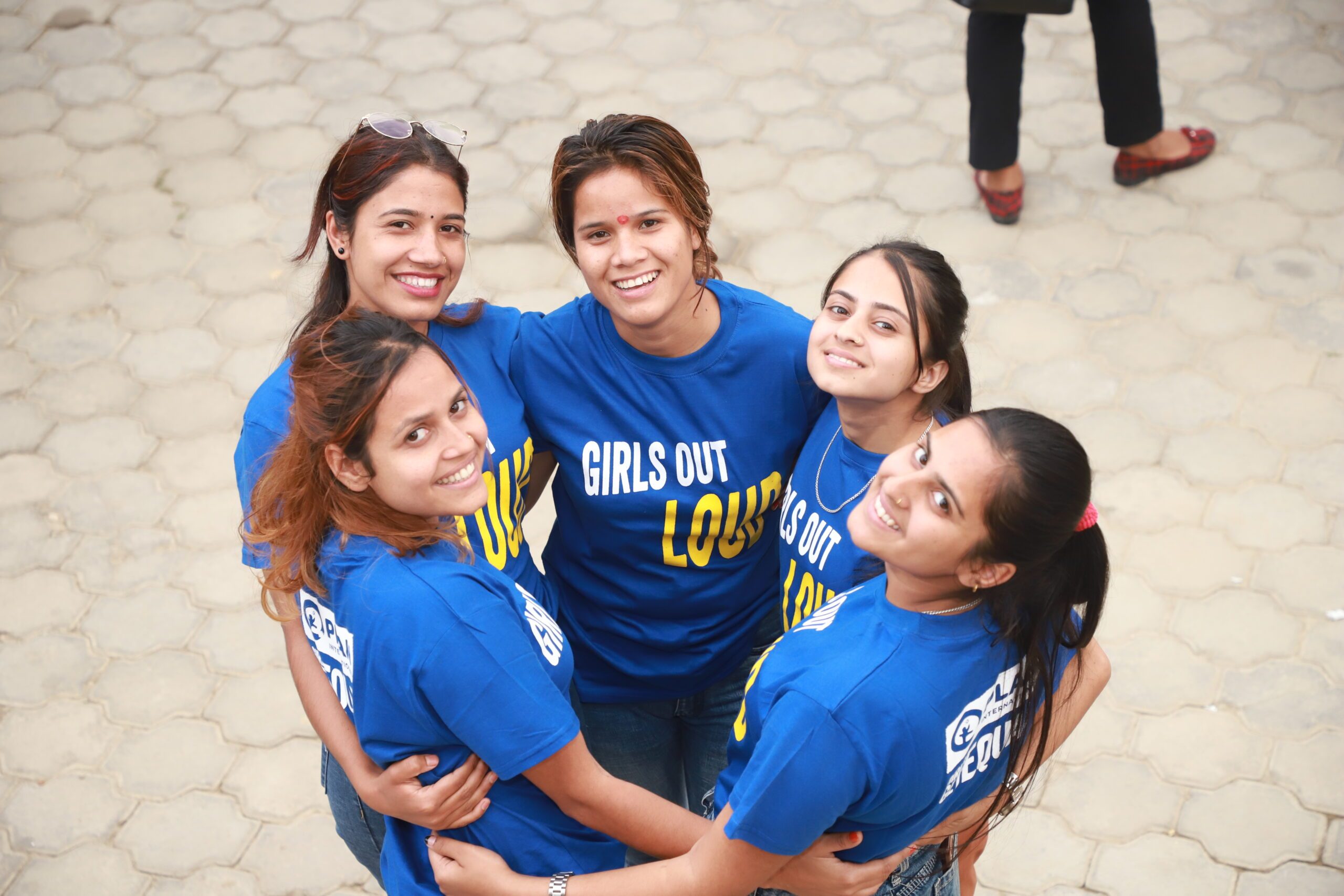 Swastika (second from right) participating in a Girls Out Loud event. 