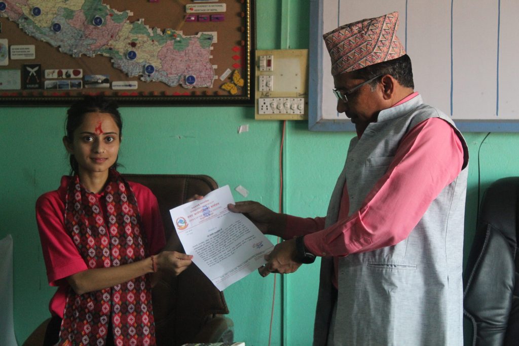 The Mayor of Ramdhuni Municipality committing to work with girls to provide quality sanitary pads in schools