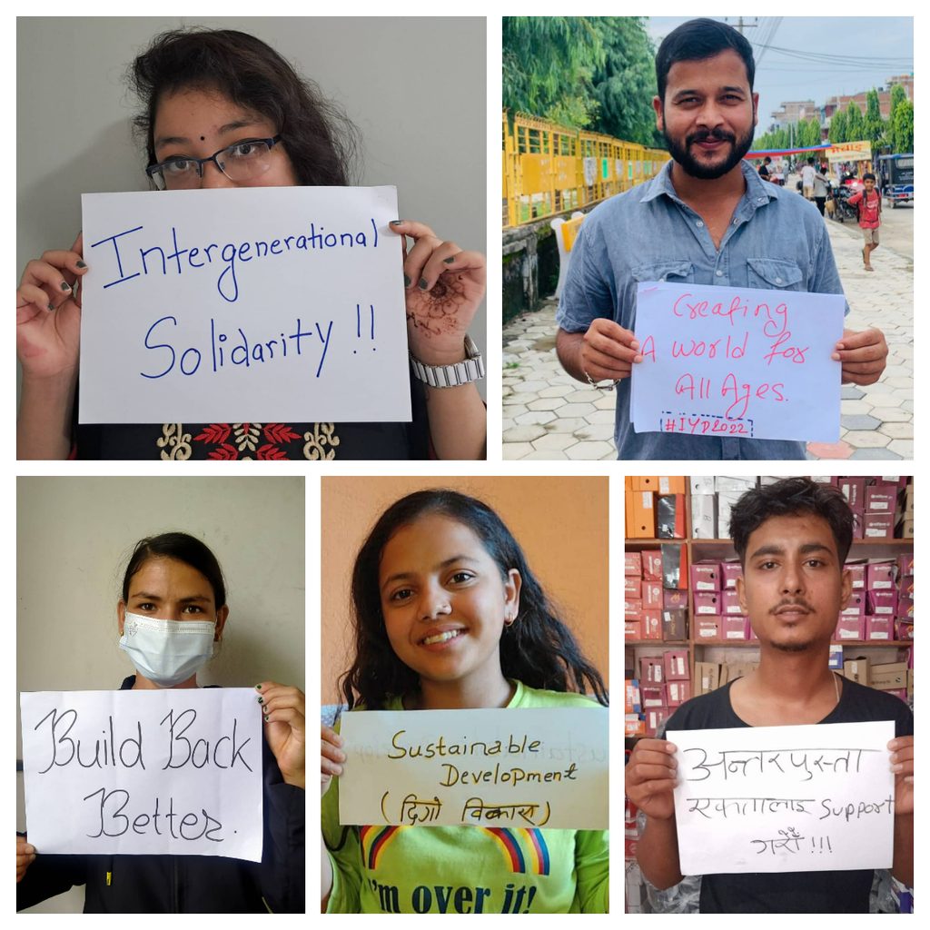 Young people showcasing messages created to celebrate International Youth Day 2022