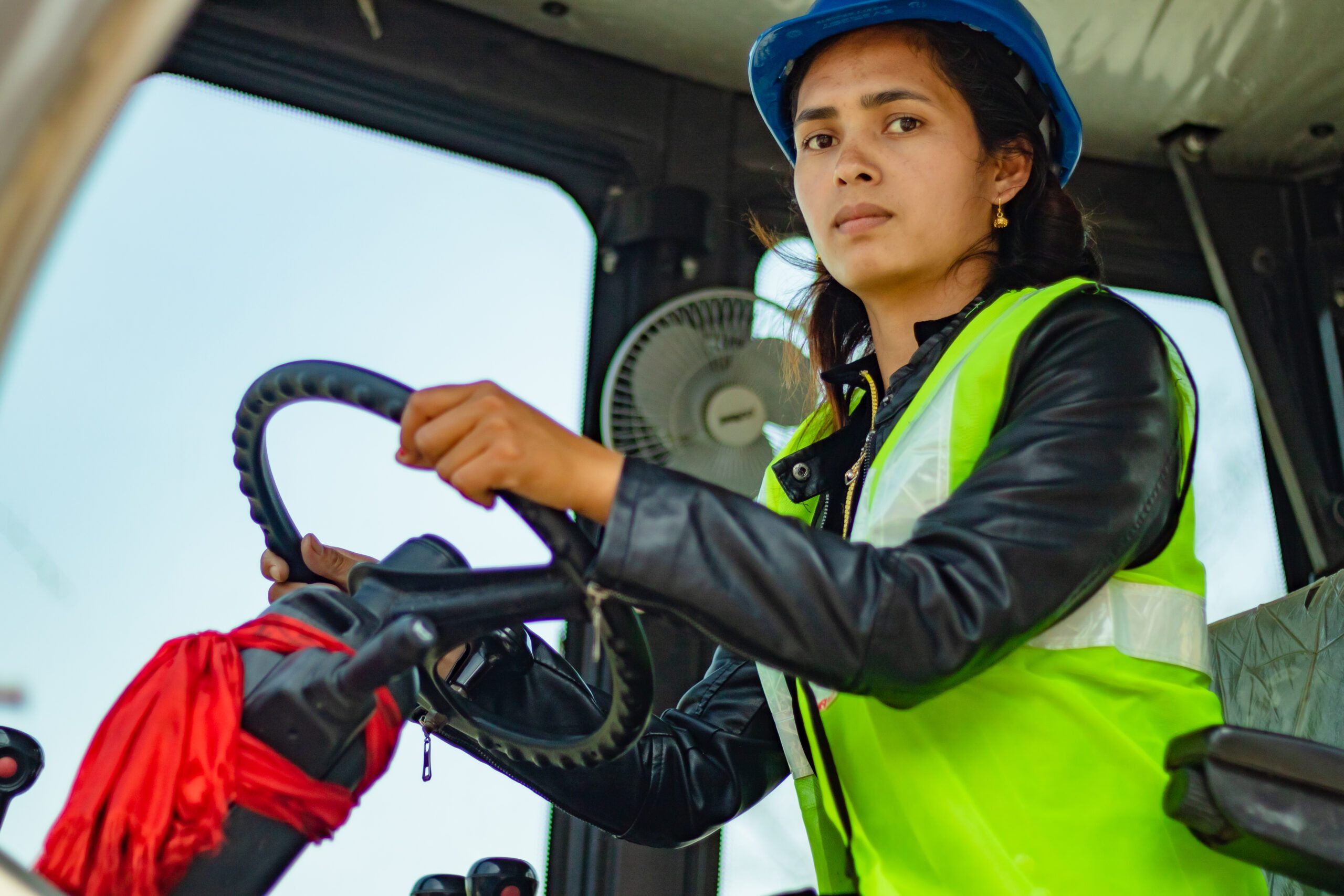 Sushma, working as an excavator operator