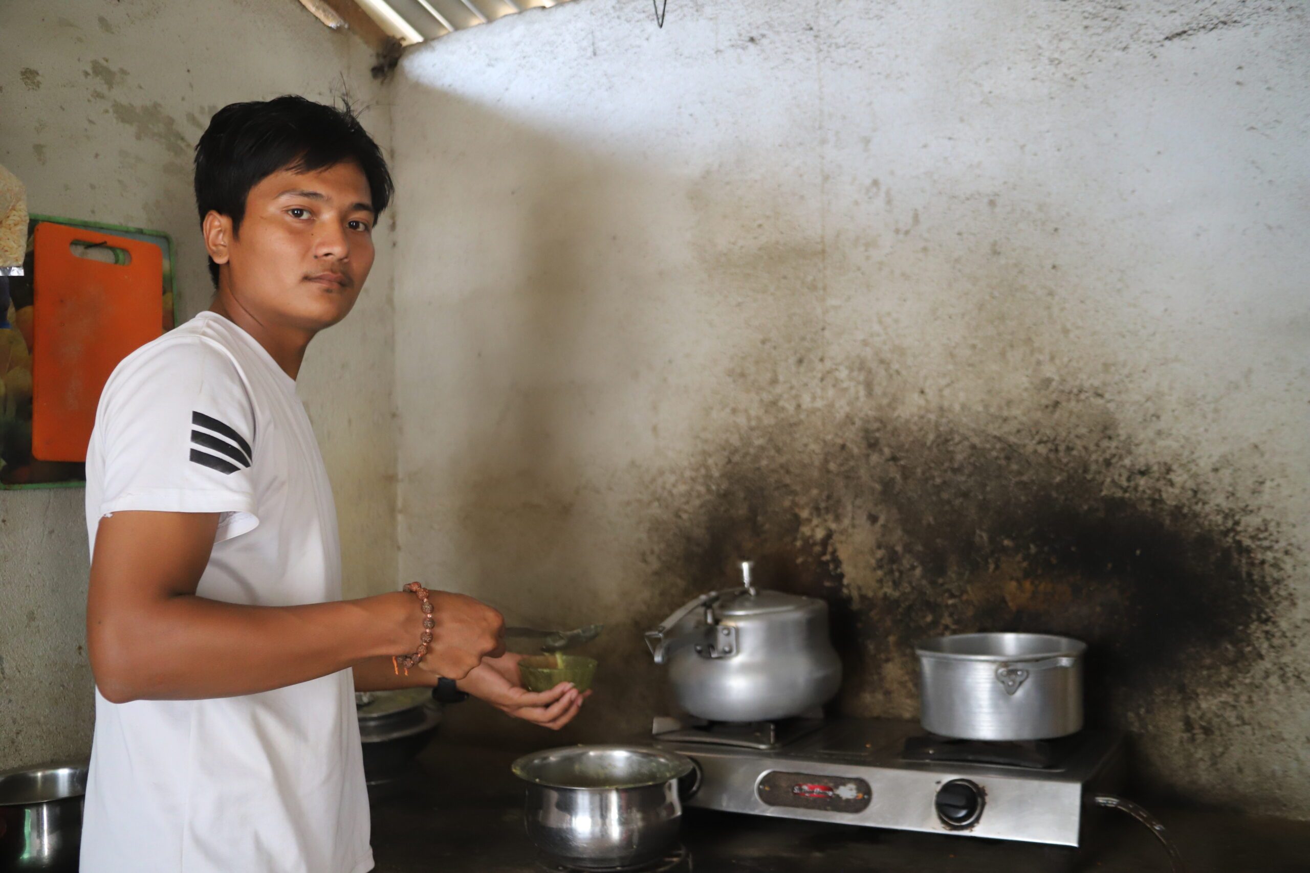 Vivek cooking at home in Nepal