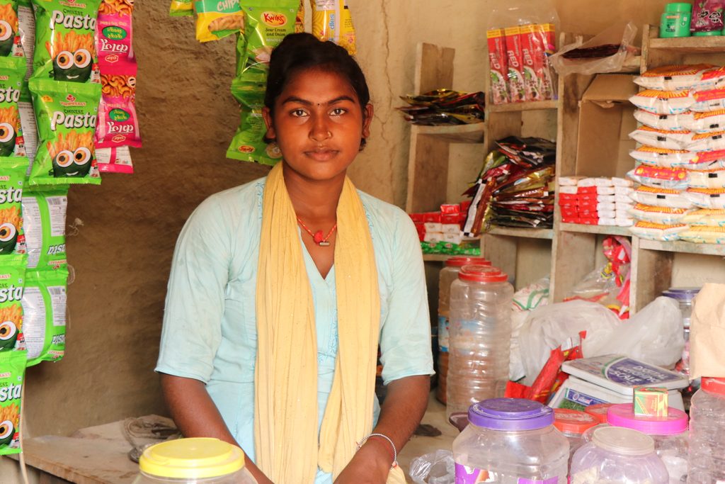 Prativa sitting in her grocery shop.