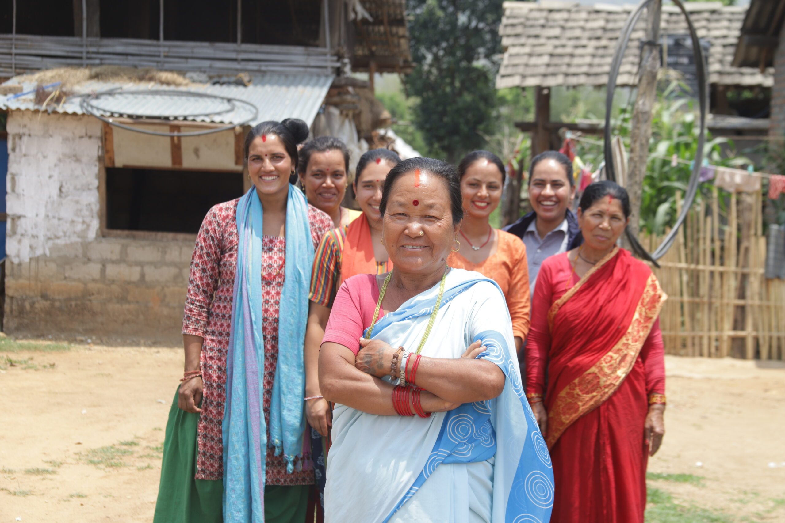 The mothers from the group standing together. 