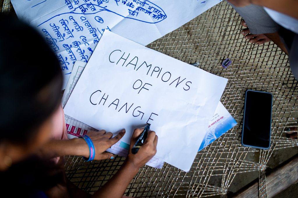Sangita drew champions of change on paper. 
