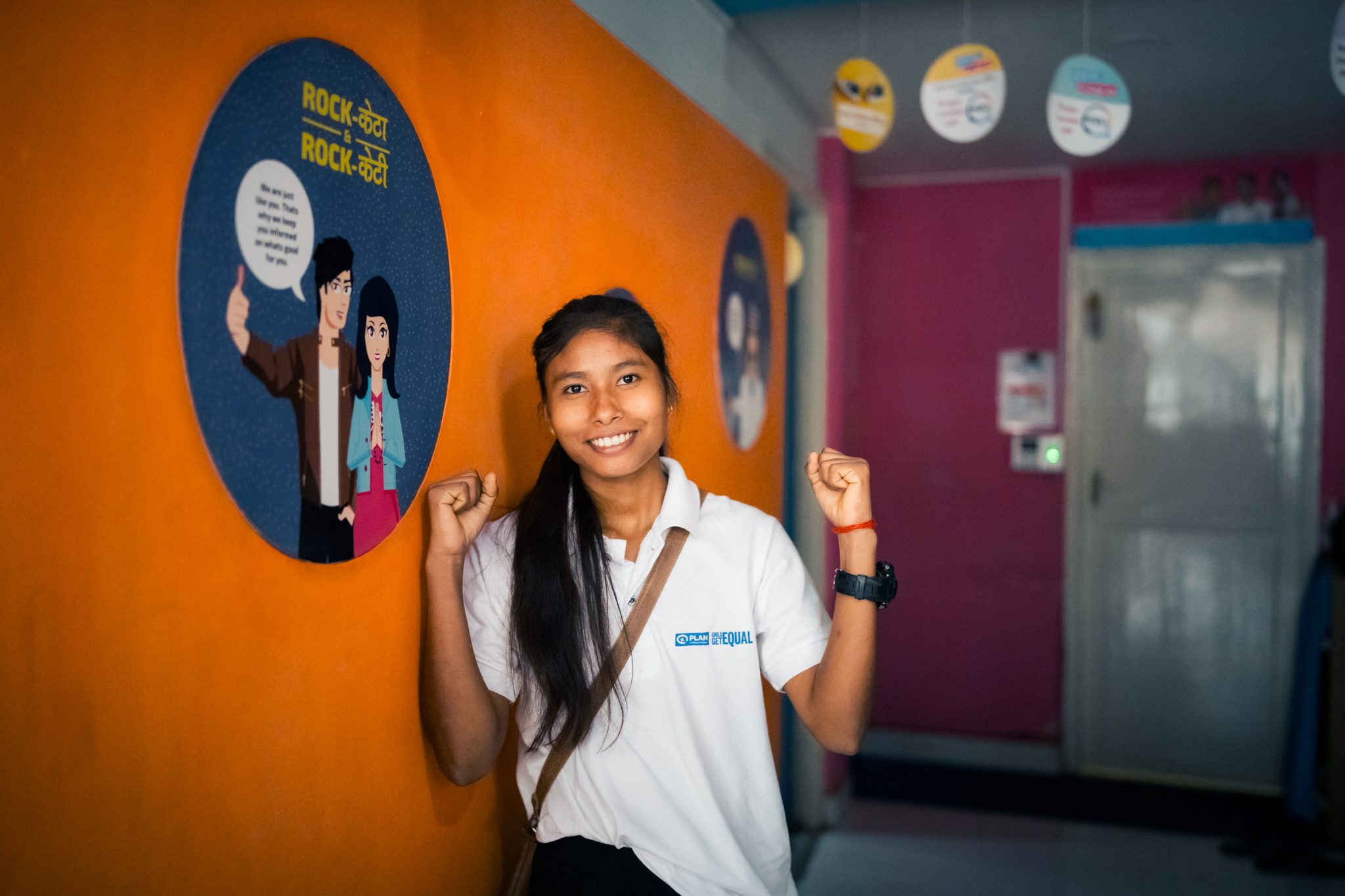 Sangita is posing at Marie Stopes Clinic during girls takeover event.
