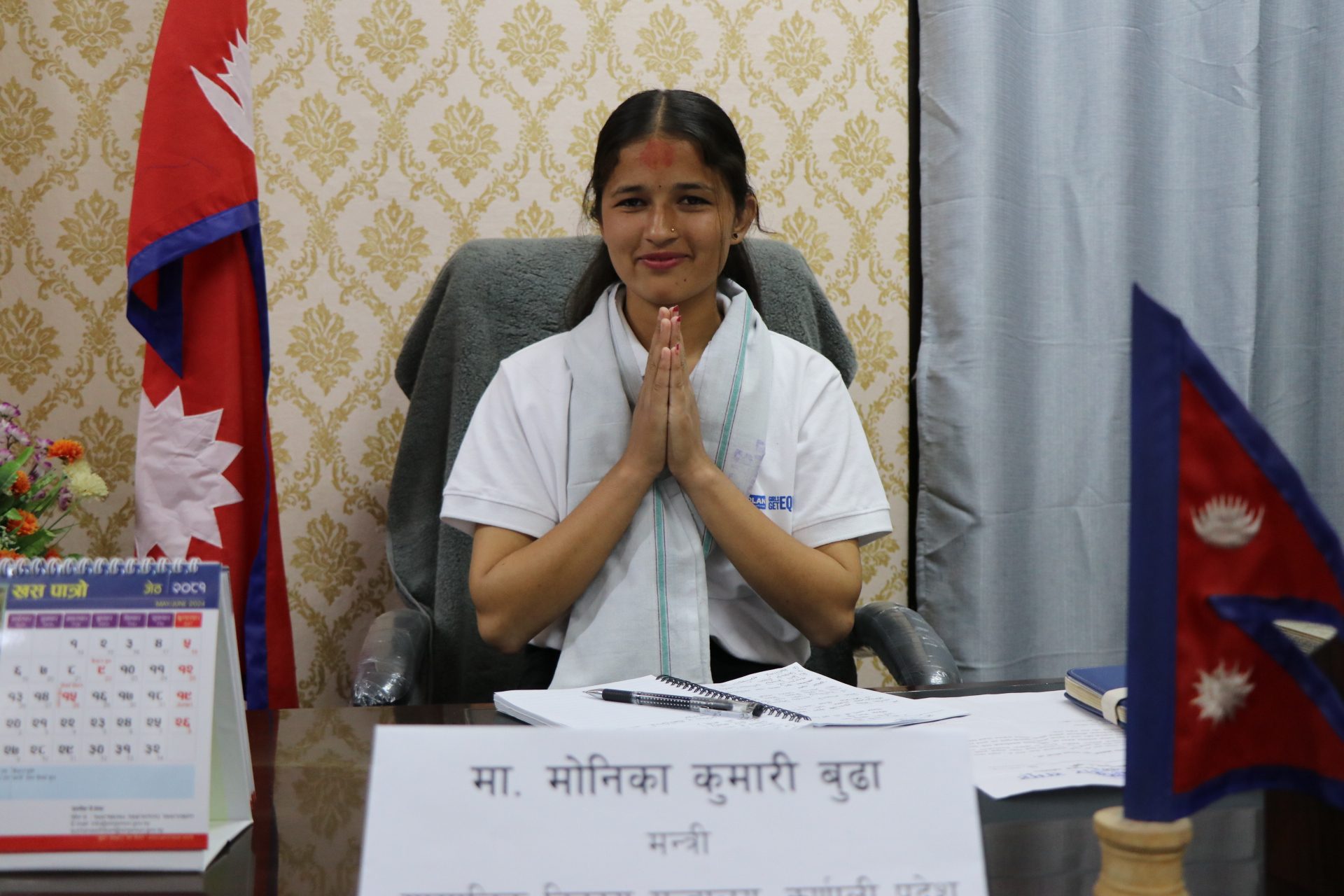 Monika joining her hands and greeting after taking over the position of the Social Development Minister of Karnali Province.