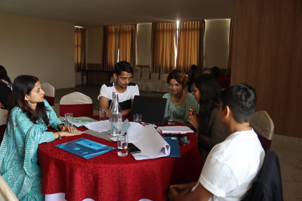 Five youth participating in youth consultation for UPR periodic review.