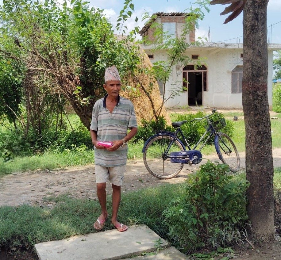 Gyan Bahadur in his passage to home carrying sanitary pads.