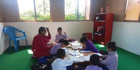 Children return to learning in new classrooms