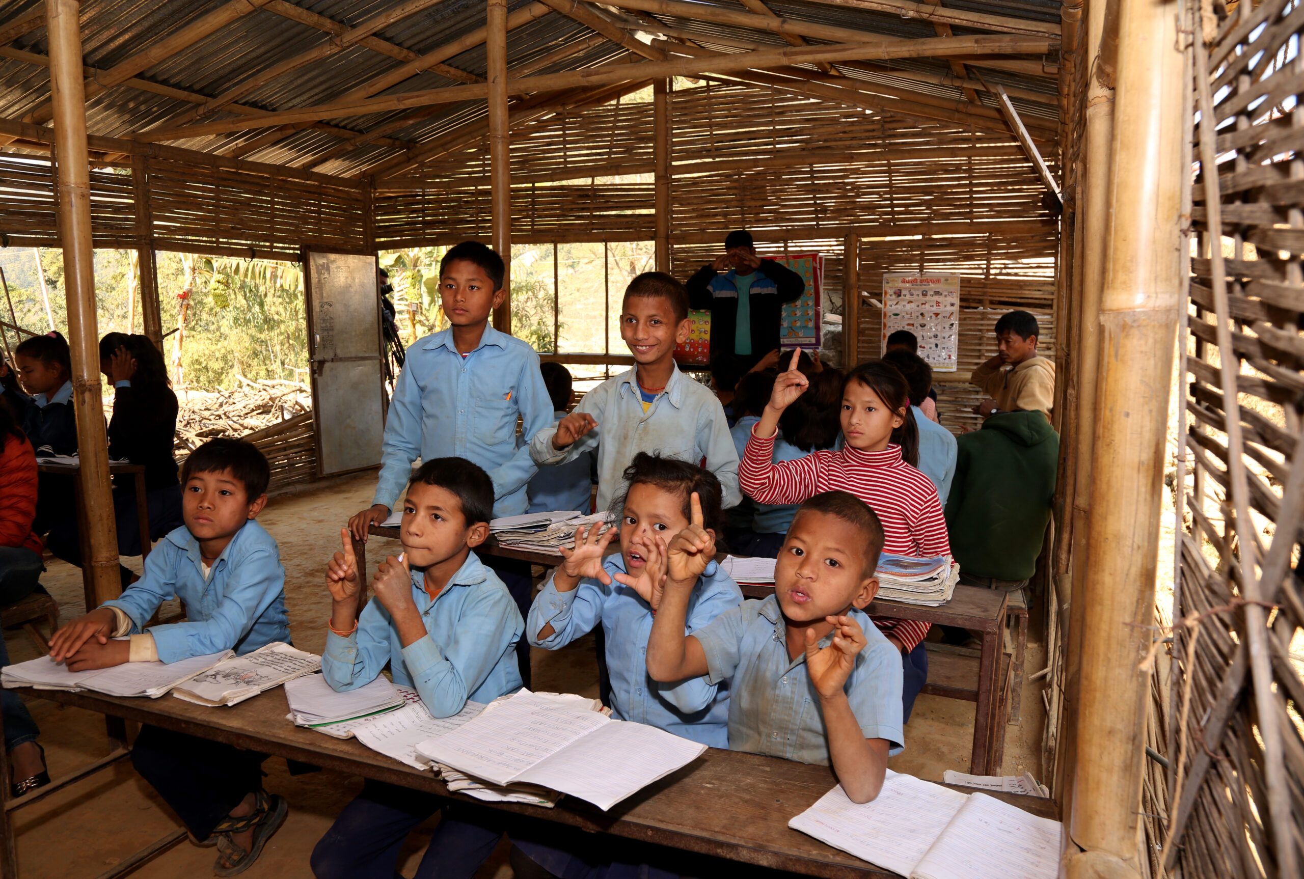 Deaf students continuing their learning in temporary learning centres after earthquake in 2015.