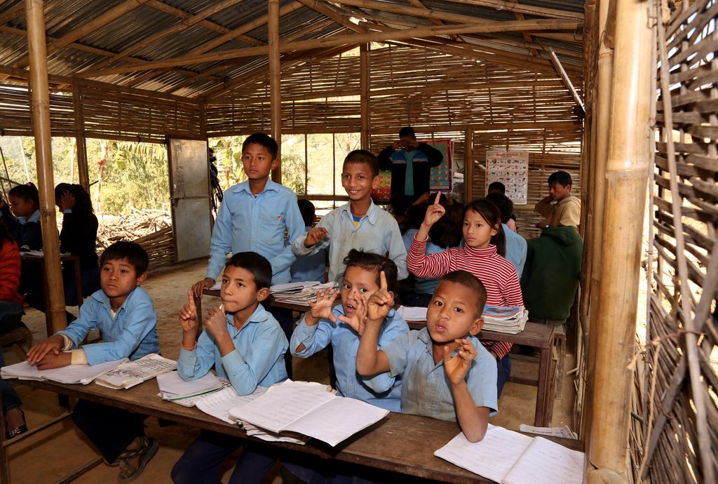Deaf students continuing their learning in temporary learning centres after earthquake in 2015.