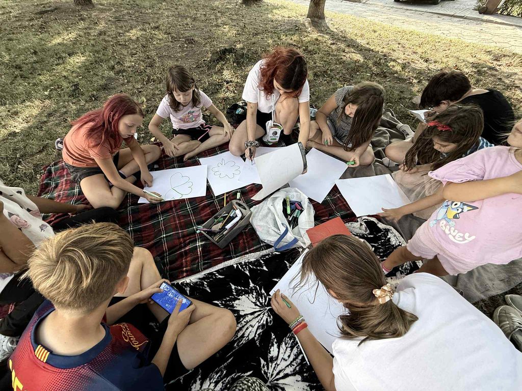 Children participating in art workshops